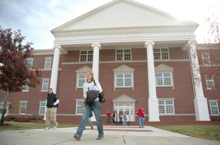 Sophomore Mary Olson, ESL major, and other Union students regularly enter and leave White Hall now in the semester after its completion.  Since the addition to Union's campus, traffic across the great lawn has increased significantly.  - Photo by Matthew Diggs
