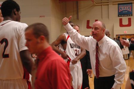 Coach Ralph Turner directs his players during a game against Freed Hardeman University.  - Photo by Neisha Fuson