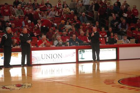 President Dockery addresses the teams and the fans at the first game in Union's home gym since the February 5 tornado. - Photo by Neisha Fuson