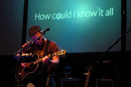 Shane Barnard plays guitar and background vocals for Bethany Dillon during the Union University benefit concert.  - Photo by Neisha Fuson