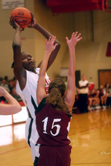 Josephine Owino goes up for a shot against Freed Hardeman University. - Photo by Kyle Kurlick