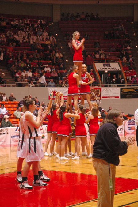 The Bulldog Cheerleaders help welcome the Lady Bulldogs onto the NAIA court.  - Photo by Neisha Fuson