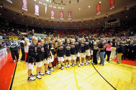 The Lady Bulldogs pose for a photo during the parade of teams at the NAIA national tournament. - Photo by Morris Abernathy