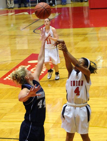 Jessica Graves releases a shot against The Master's College (Calif.) during the second round of the NAIA national tournament. - Photo by Morris Abernathy