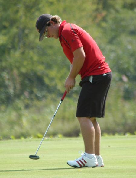 Brian Glover follows through on his put as he watches it move toward the hole. - Photo by Steven Aldridge