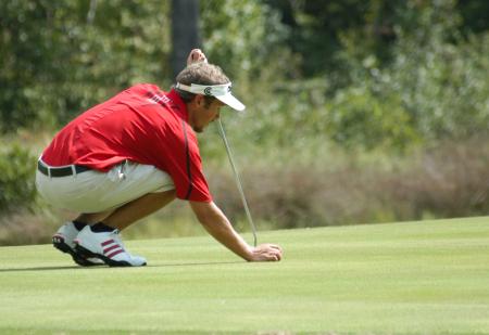 Gary Glapa lines up his put during play in the Union Invitational at Falcon Ridge. - Photo by Steven Aldridge