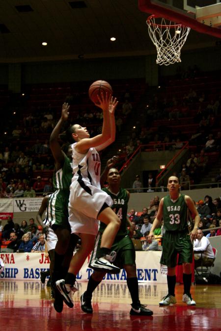 Kaitlin Dudley goes up for a lay-up during the first round game of the NAIA tournament. The Lady Bulldogs won the game 95-66. - Photo by Kristi McMurry Woody