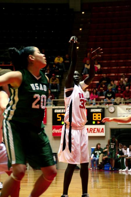 Zeinab Chan follows through on a free throw shot during the first round of the NAIA tournament. - Photo by Kristi McMurry Woody