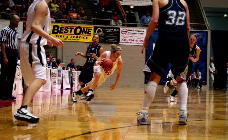Freshman guard Kayla Hudson get away from a defender during the 2008 NAIA National Tournament.   - Photo by Morris Abernathy