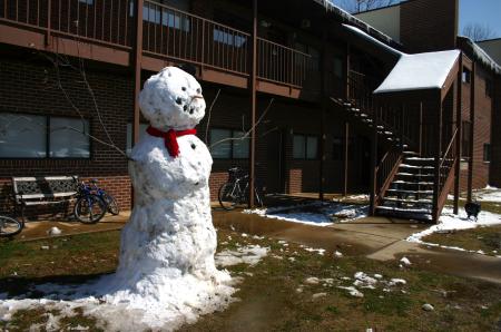 Snow covered Union's campus the night of Mar. 7, and students took a break from studying to play in it.  A ten foot snow man stands in front of Rogers in McAfee. - Photo by Stephanie Schroeder