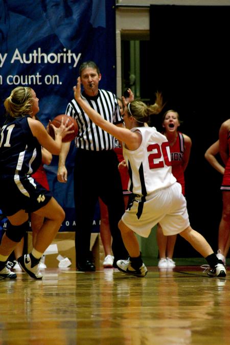 Kayla Hudson defends a Vanguard player during the semi-final game of the NAIA tournament.  - Photo by Kristi McMurry Woody