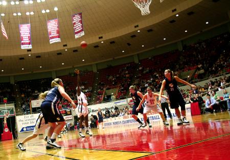 Josephine Owino puts up a free throw during the semi-final game of the NAIA tournament against Vanguard. - Photo by Kristi McMurry Woody