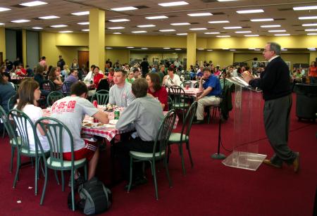 President Dockery speaks to faculty, staff and students at the barbeque lunch provided and prepared by Gwatney Chevrolet in response to the February 5 tornado.   - Photo by Kristi McMurry Woody