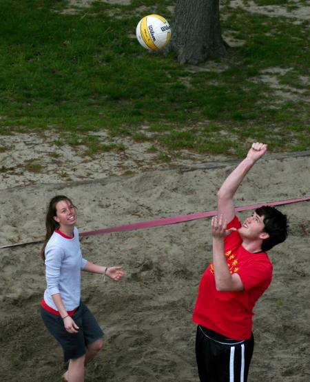 Todd Buck, sophomore accounting major, hits the ball over the net during the volleyball tournament that raised money for the disaster relief fund. - Photo by Kristi McMurry Woody