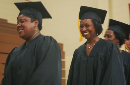 Kimberly Ingram, social work major from Jackson, Tenn., awaits her degree at the summer graduation ceremony. - Photo by Angela Abbamonte