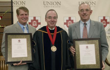 (L-R) Will Hall, executive editor of Baptist Press and vice president for news services of the Southern Baptist Convention Executive Committee, President Dockery, and Lonnie Wilkey, editor of <em>Baptist and Reflector</em>.  President Dockery honored Wilkey and Hall for their work in reporting on the Feb. 5 tornado that caused $40 million in damage to the Union campus. - Photo by Justin Veneman