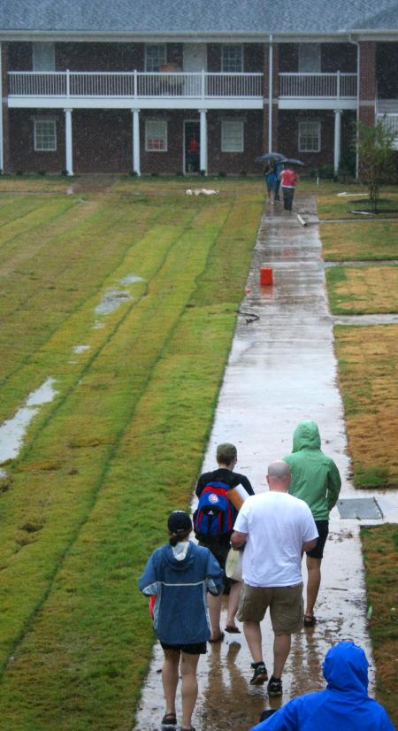 Faculty, staff, and upperclassmen helped new Union students move into the brand new residence life complex despite cold rain and muddy sidewalks. - Photo by Kristi McMurry Woody