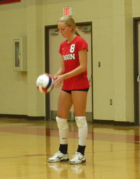 Amanda Hutchison Coyle prepares to serve the ball. - Photo by Steven Aldridge