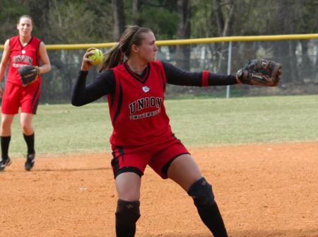 Brittany Burkett tosses the ball to first base after make a play at her position of third base. - Photo by Steven Aldridge