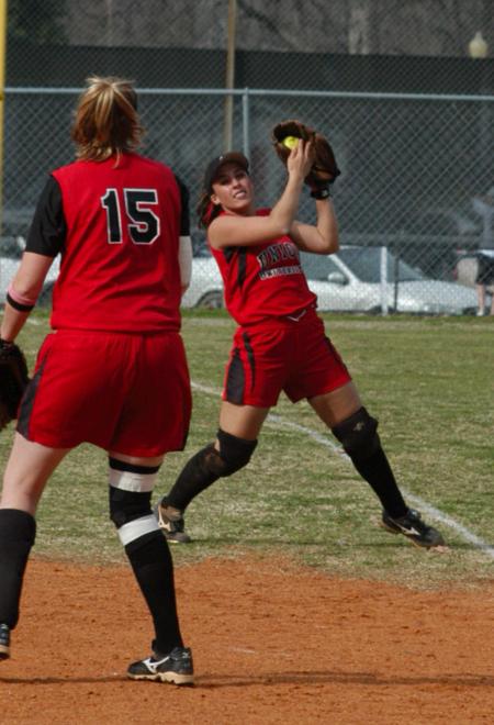 Candace Cross makes a running catch in short right field. - Photo by Steven Aldridge
