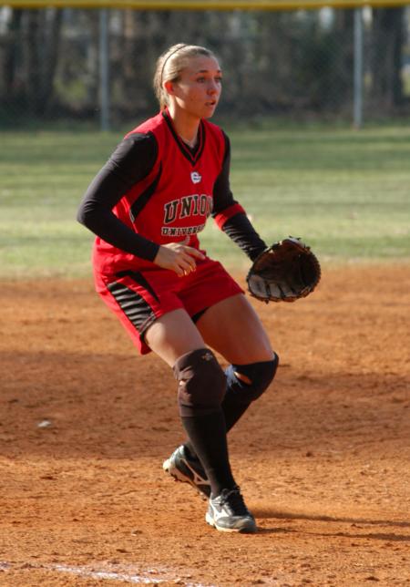 Brittany Burkett gets ready for the pitch as she moves into position at third base. - Photo by Steven Aldridge