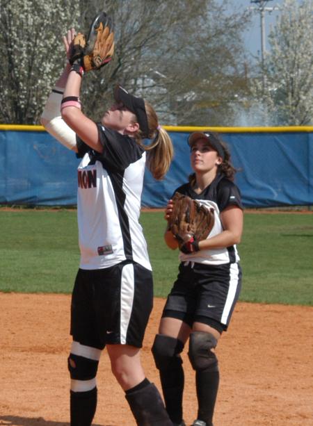 Ashley Blankenship catches a pop up while second baseman Candice Cross watches. - Photo by Steven Aldridge