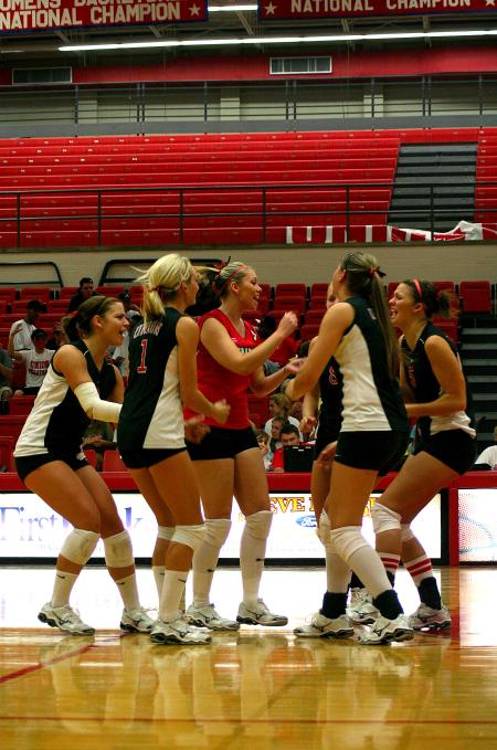 The Lady Bulldog volleyball team celebrates a point against Martin Methodist.  The team won this match 3-0. - Photo by Kristi McMurry Woody