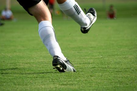 A powerful kick from a Union defender sends the ball down the field in a game against Oklahoma Baptist University. - Photo by Kristi McMurry Woody