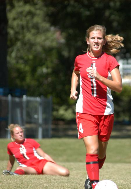 Emily Rawls runs to get loose Caitlin Zimmerman stretches prior to a match. - Photo by Steven Aldridge
