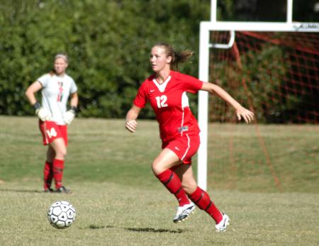 Korie Elrod quickly moves the ball up the field. - Photo by Steven Aldridge
