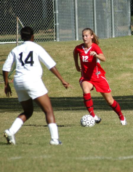 Korie Elrod moves the ball up the field. - Photo by Steven Aldridge
