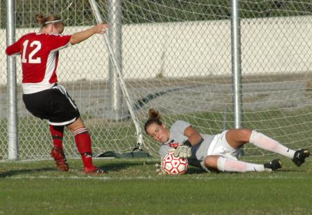 Laura Pla lays out for a save. - Photo by Steven Aldridge