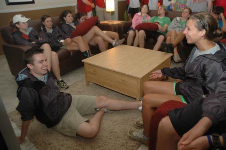 Several Union students cram into the commons on Thursday to seek shelter from the rain while waiting to help with Freshman move-in.  - Photo by Beth Spain