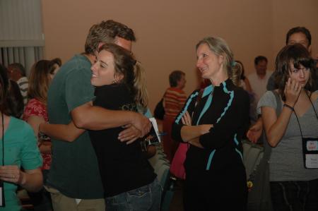 Amanda Ellis from Arlington, Tenn. hugs her dad as she says goodbye after the Focus evening worship service. - Photo by Beth Spain