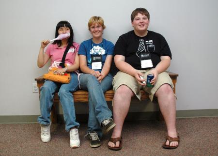 Aelin Lee, Corrin Akers, and Jed Dugger fellowship before the Focus show on Thursday night. - Photo by Beth Spain