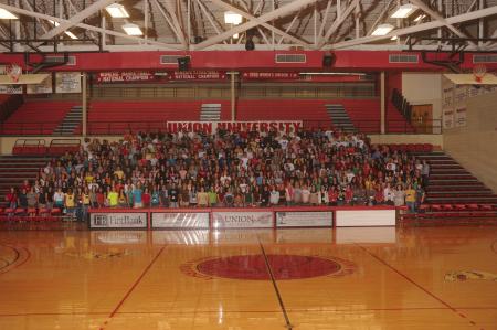 The Class of 2012 poses for a group shot in the Fred DeLay Gymnasium. - Photo by Morris Abernathy
