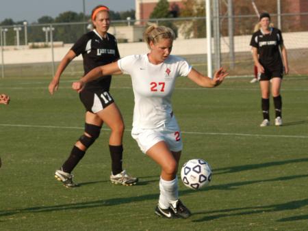 Katelin Dirksen works for ball control as she attempts to send the ball back to the Union offense. - Photo by Tommy Sadler