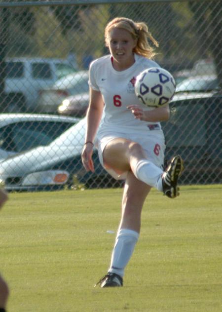 Sam Gase clears the ball from her defensive end of the field. - Photo by Tommy Sadler
