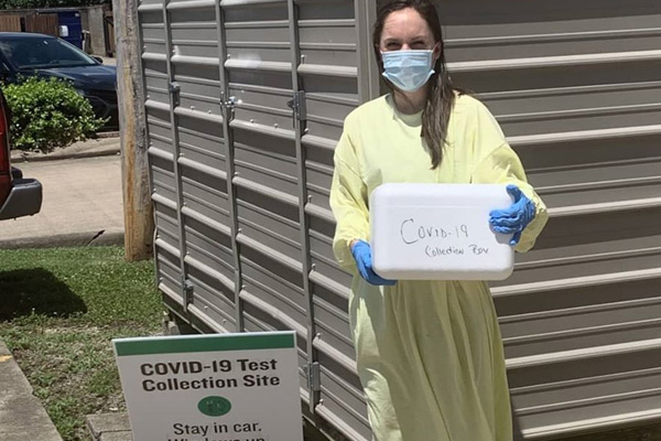 Alumnus working at a COVID-19 testing site