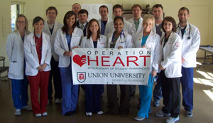 Photo of the APhA-ASP members with their Operation Heart banner.