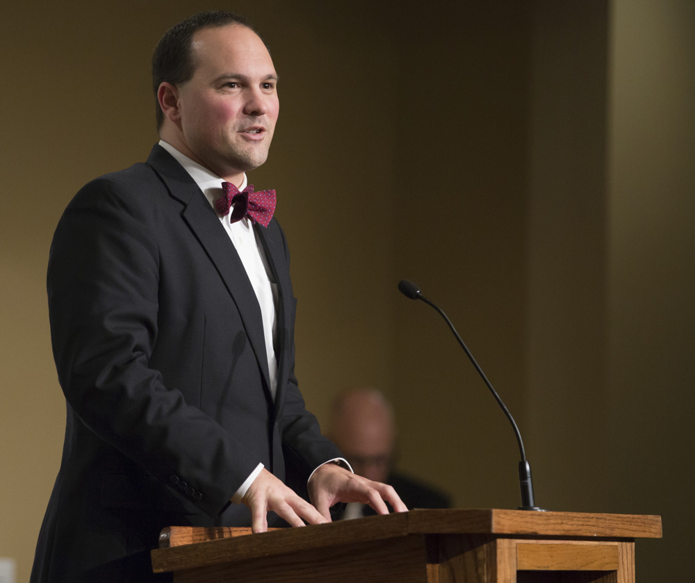 Wainscott accepting award