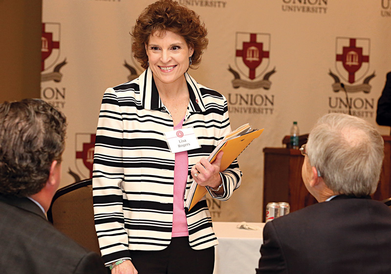 Rogers at a trustee meeting