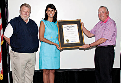 Ralph Thomas receives award from Governer Nikki Haley.
