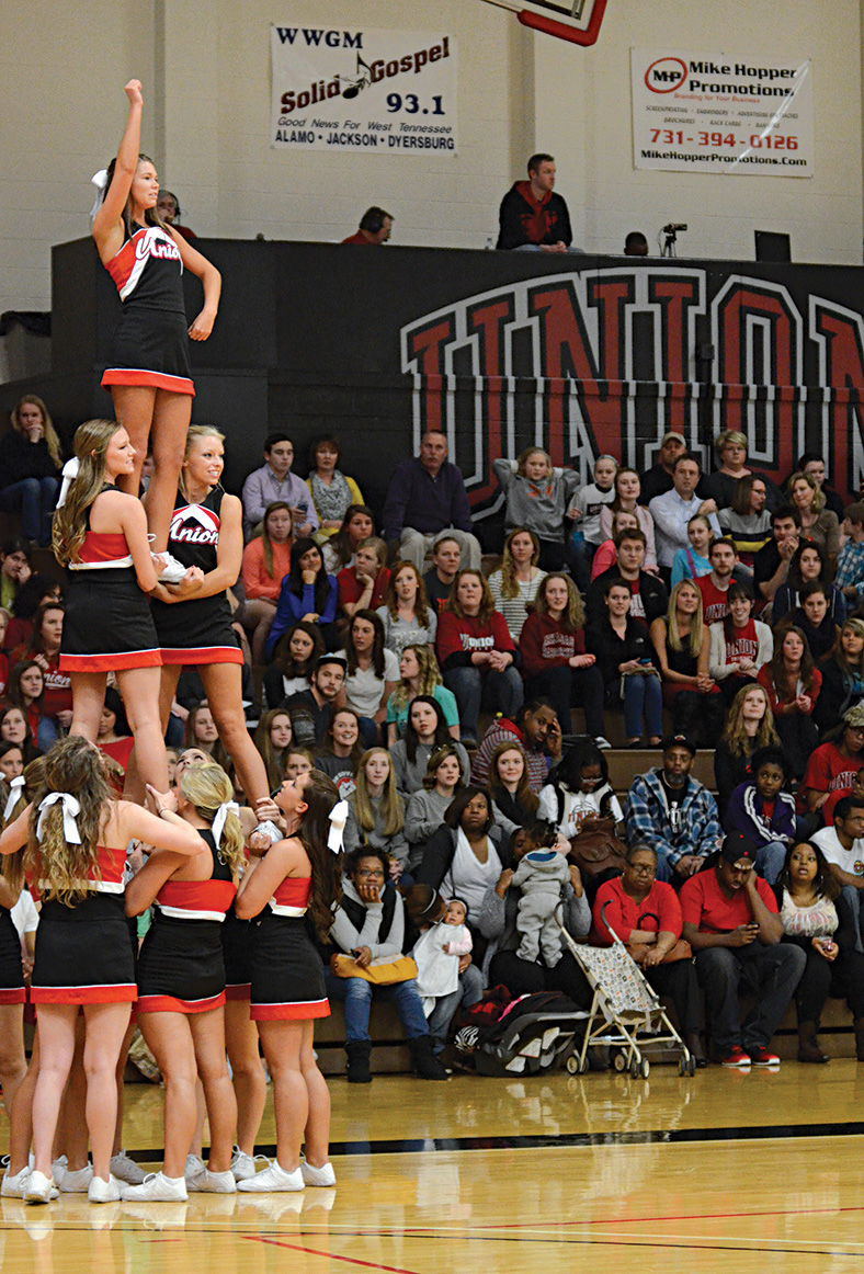 Cheerleaders entertain the crowd during a timeout of the homecoming game against Delta State.
