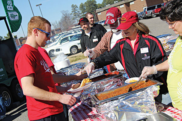 Michael Adkisson, junior business administration major, gets some chips at the Union Strong event during homecoming weekend. The event was a time for the Union community to come together and enjoy fellowship.
