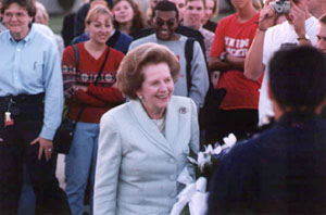 Lady Thatcher being greeted by students