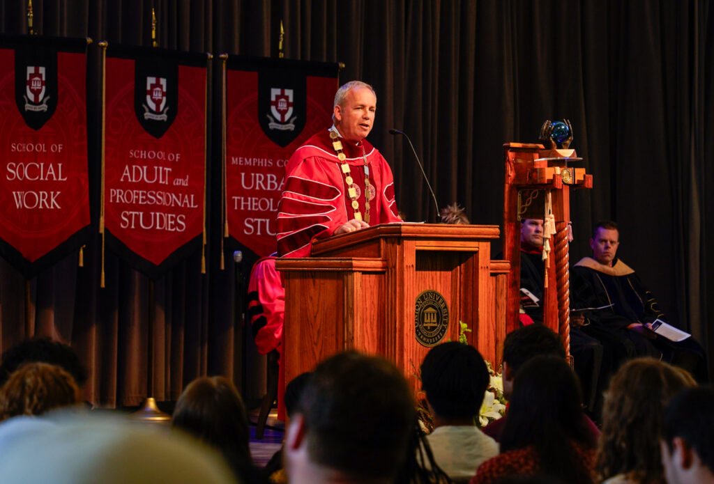 Dub speaking at fall convocation