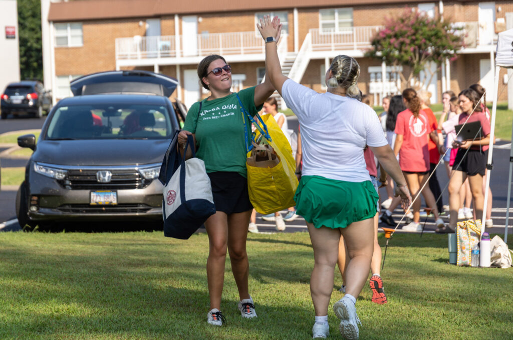 Move-in Day high-five